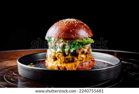beef burger with meat, mushroom, vegetables and cheese