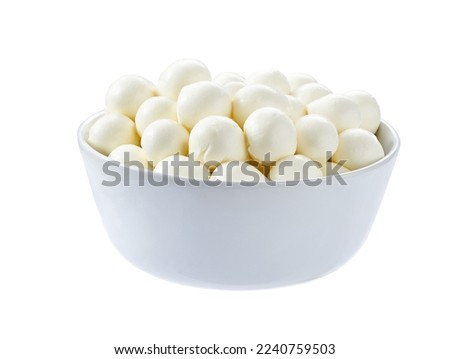 Ceramic plate with baby mozzarella cheese balls isolated on white background.