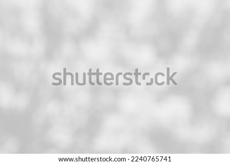 White blurred background with glitter for display, white bokeh, white background.