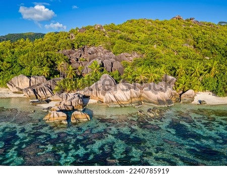 Aerial view of Beach Anse Source d'Argent, La Digue, Seychellen in evening light Royalty-Free Stock Photo #2240785919