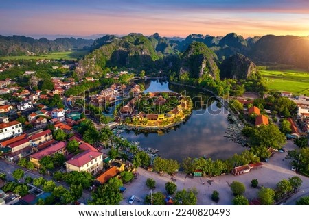 Aerial view of Tam coc at sunrise in Vietnam. Royalty-Free Stock Photo #2240820493