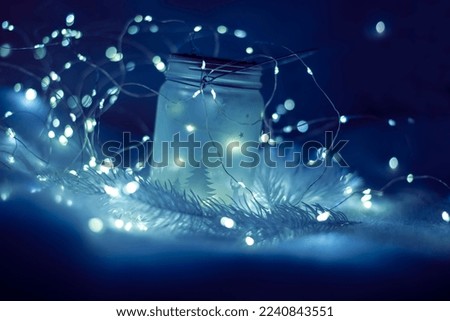New Year Christmas fabulous magical background with glittering lights and magic lanterns. Selective soft artistic focus.
