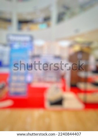 Abstract Blur background electronic fair expo at mall exhibition hall trade event. vintage tone effect image 