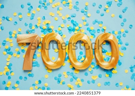 7000 seven thousand followers card. Template for social networks, blogs. on yellow and blue confetti Festive Background media celebration banner. 7k online community fans. 7 seven thousand subscriber