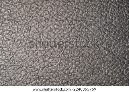 The texture of artificial leather. Black artificial leather. Royalty-Free Stock Photo #2240855769