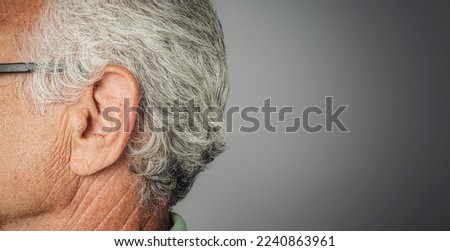 elderly male ear close up Royalty-Free Stock Photo #2240863961