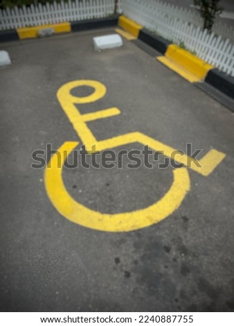 Defocust Blur Background of Disabled Special Parking Signs on the yard