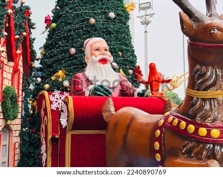 Santa Claus sleigh ride with reindeer.