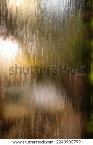 Glass Blur with water cascading Royalty-Free Stock Photo #2240905799