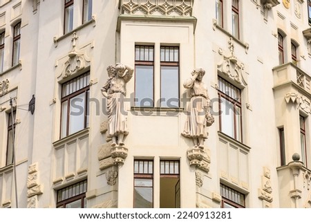 Corner of the house of classical European architecture of the old cozy tourist city. Background with selective focus and copy space