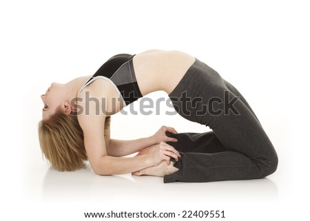 caucasian teenager practicing yoga on a white background