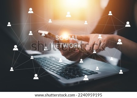 businessman using smartphone with social media, phone with a notification people icon,Social Distancing ,Working From Home concept,international consulting company. Social networking hologram icons.