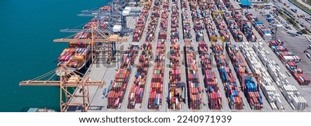 Panorama view of international containers cargo ship at industrial import-export port transport goods around world, global transportation and logistic business.Oversea international Business. Royalty-Free Stock Photo #2240971939