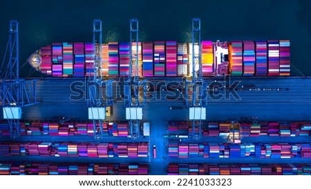Top view of International Container ship loading and unloading at sea port, Freight Transportation, Shipping, Nautical Vessel. Logistics, import export, oversea Transportation. Royalty-Free Stock Photo #2241033323