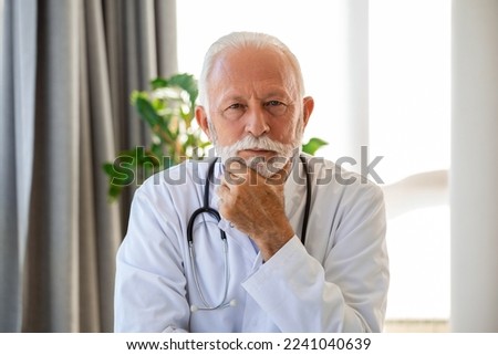 Portrait of senior mature health care professional, doctor, with stethoscope