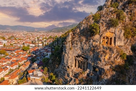 Lycian ancient old Tombs around Fethiye Turkey, arial top view. Royalty-Free Stock Photo #2241122649