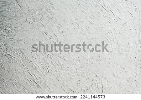 new white painted cement wall quicklime mixed with water then put it on the wall to save time It's not a smooth job, but it's stylish. Use it as a background for text.