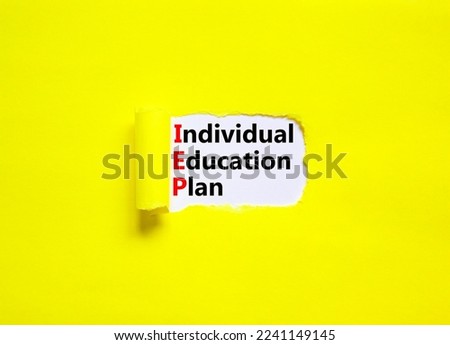 IEP individual education plan symbol. Concept words IEP individual education plan on white paper on a beautiful yellow background. Business IEP individual education plan concept. Copy space.