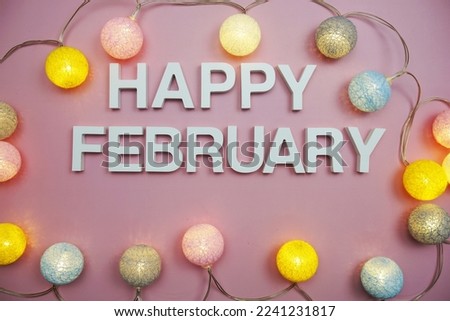 Happy February alphabet letters on pink background