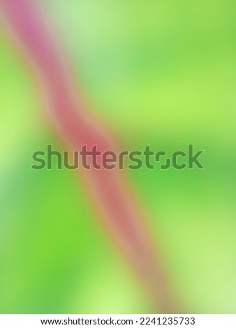 Abstract blurred greenish red leaf background and texture. 