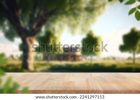 Wood table top with fence and grass in garden background.For create product display or design key visual layout