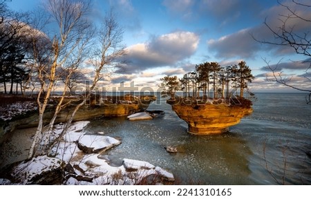 Turnip Rock in winter, Lake Huron, Michigan. Royalty-Free Stock Photo #2241310165