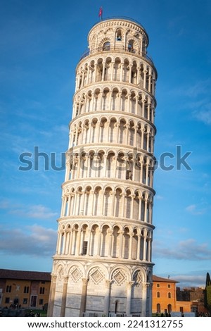 The Leaning Tower of Pisa (Italian: torre pendente di Pisa), is the campanile, or freestanding bell tower, of Pisa Cathedral Royalty-Free Stock Photo #2241312755