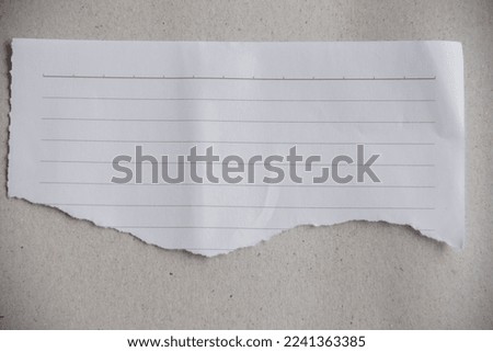 ripped  note paper for writing messages