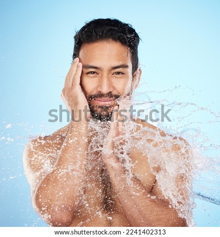 Portrait, water splash or man in shower in studio cleaning his face or body for beauty, skincare or self love. Wellness, luxury or healthy male model washing body in natural grooming morning routine