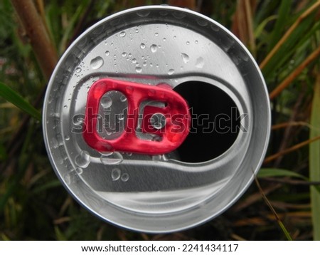 a drink can pictured from above