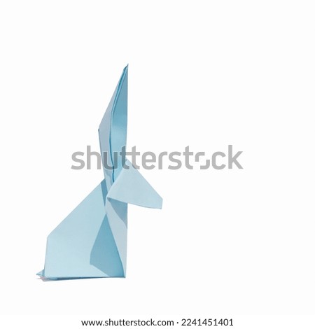 Creative greeting card design made of pastel blue rabbit on a white background. Lunar, Chinese New Year composition for 2023. Year of the Rabbit.