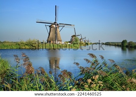 Historic windmills at Kinderdijk, Kinderdijk-Elshout, Holland, Netherlands Royalty-Free Stock Photo #2241460525