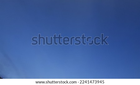 PHOTO OF BLUE SKY AT EVENING