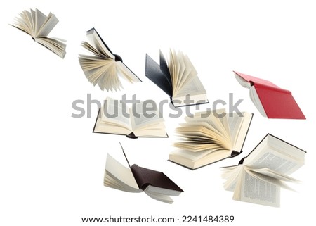 Many hardcover books flying on white background