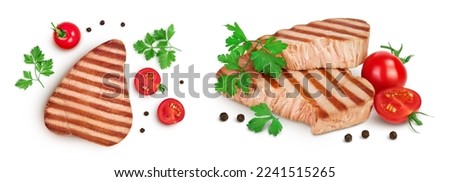 Tuna fish steak grilled isolated on white background with full depth of field. Top view. Flat lay