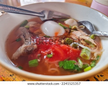 'Yen Ta Fo' Mixed thai Noodles and red sauce Soups