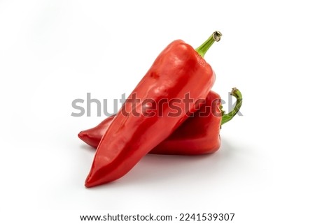 Two fresh sweet red peppers paprika isolated on white background, clipping path included Royalty-Free Stock Photo #2241539307