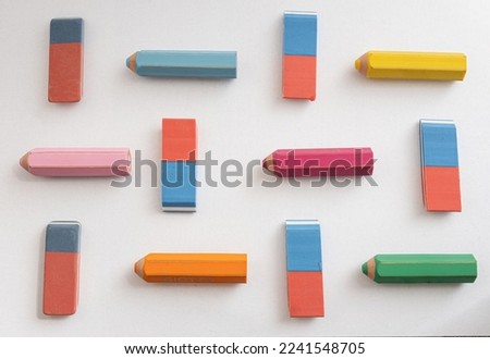 erasers placed on the paper