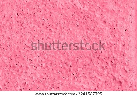 Concrete texture tinted in trend color of 2023. Natural background. Color swatch on light concrete wall. Space for text. Top view