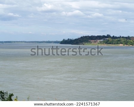 View of the Mekong River that separates Thailand and Laos. From the picture showing shallow depth, polished depth