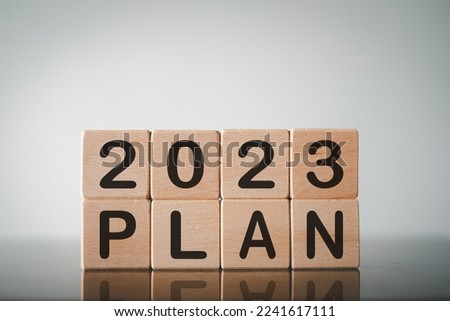 Business goal,target,plan and strategy in 2023 year,new year 2023 concept.,Wooden cube stack with 2023 PLAN word over white background with copyspace.