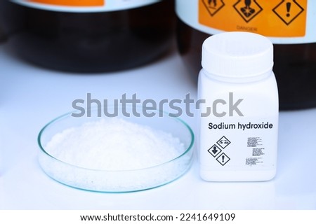 sodium hydroxide in bottle , chemical in the laboratory and industry, Chemicals used in the analysis Royalty-Free Stock Photo #2241649109