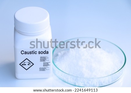 caustic soda in bottle , chemical in the laboratory and industry, Chemicals used in the analysis Royalty-Free Stock Photo #2241649113