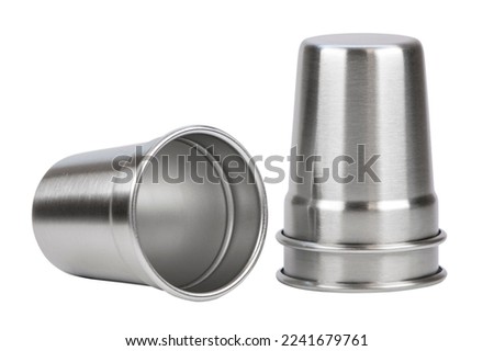Steel shot glasses isolated on white background. Bar accessories and tools for making cocktail.  Royalty-Free Stock Photo #2241679761
