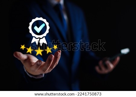 Quality Assurance Concept. Business people show high quality assurance mark, good service, premium, digital signature, premium service assurance, excellence service, high quality, excellence guarantee Royalty-Free Stock Photo #2241750873