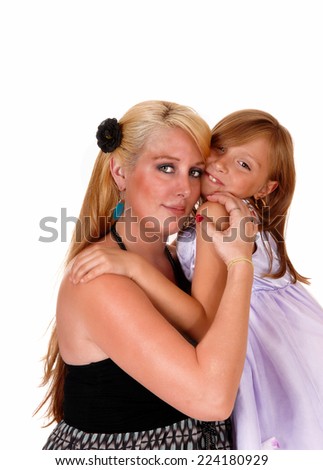 A lovely picture a mother hugging her little daughter, looking into the camera, isolated for white background. 