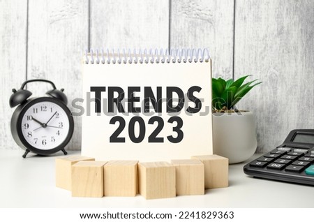 Trends 2023 words with clock and wooden blocks