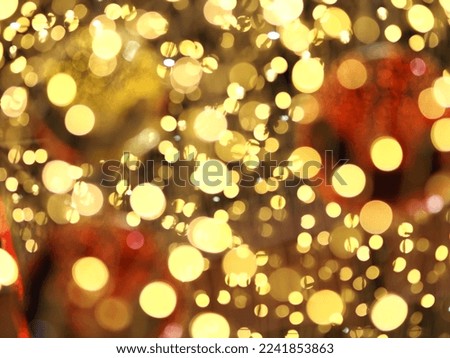 Golden glittering christmas lights blurred abstract background