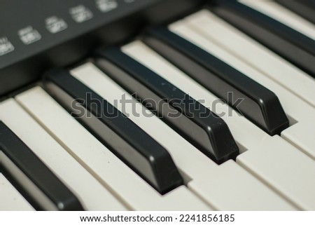 close up of synthesizer keys, piano. digital keyboard keys.
