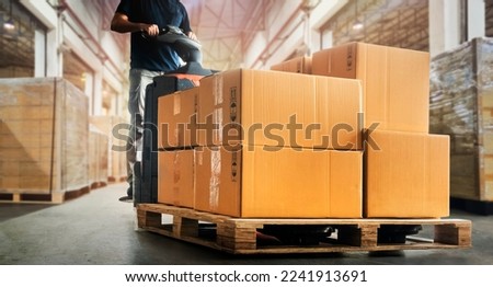 Workers Unloading Packaging Boxes on Pallet in Warehouse. Electric Forklift Loader. Cartons Cardboard Boxes. Supplies Shipping Warehouse. Supply Chain Shipment Goods. Distribution Warehouse Logistics	 Royalty-Free Stock Photo #2241913691